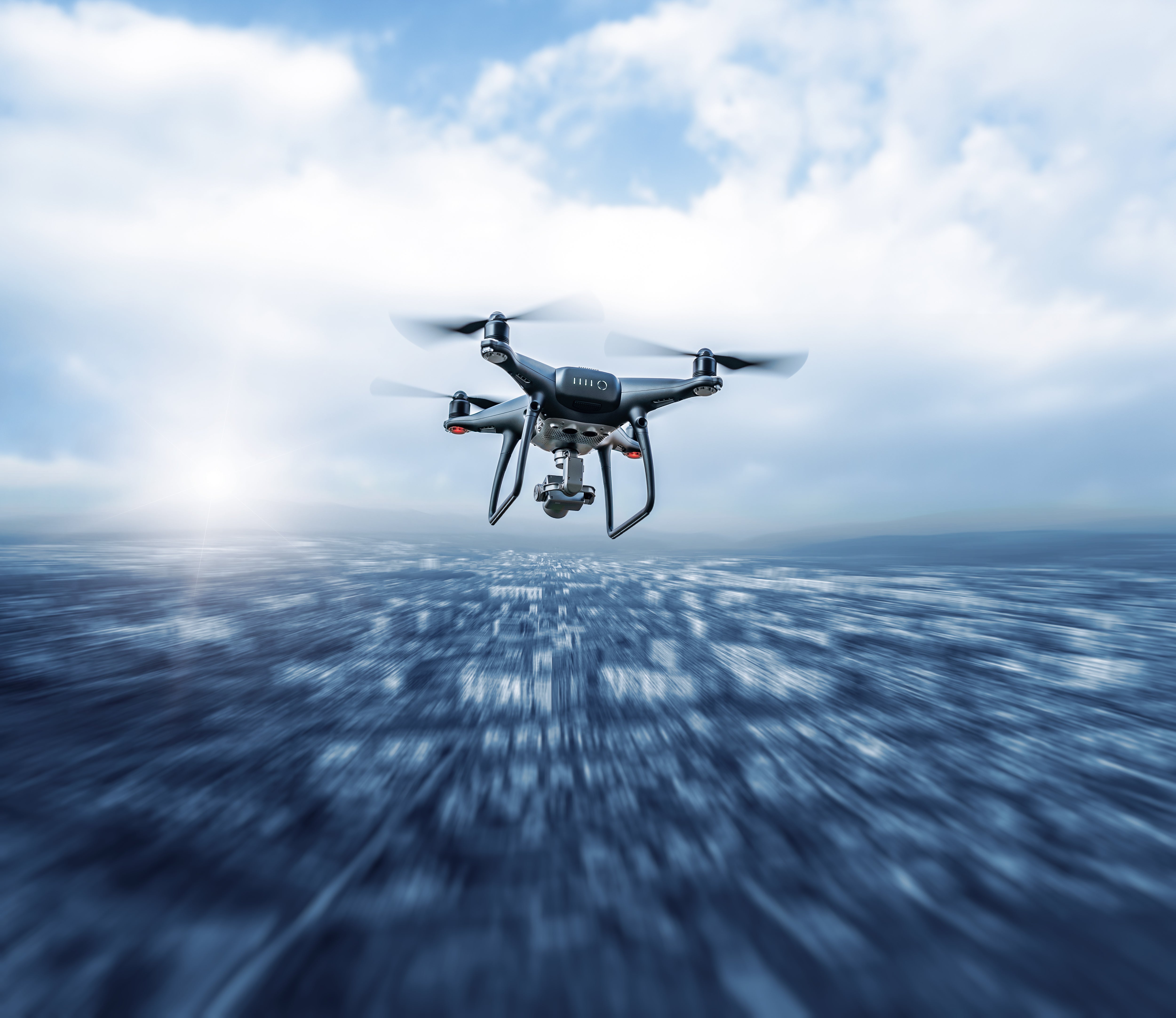 A drone flying over a city